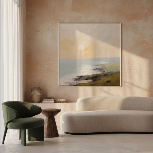 Modern living room with a painting of a coastal scene on a wall.