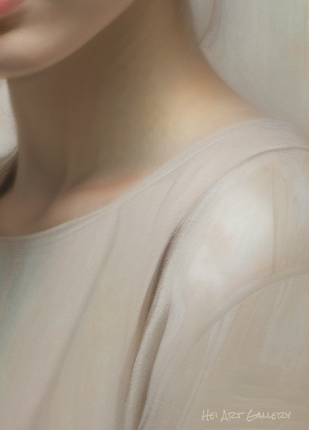 Close-up of a person wearing a light-colored top with a blurred background