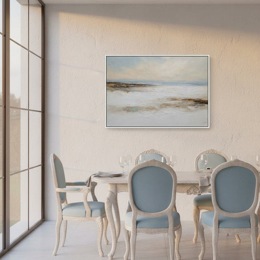 Dining room with a round table and chairs, featuring a large abstract painting on the wall.