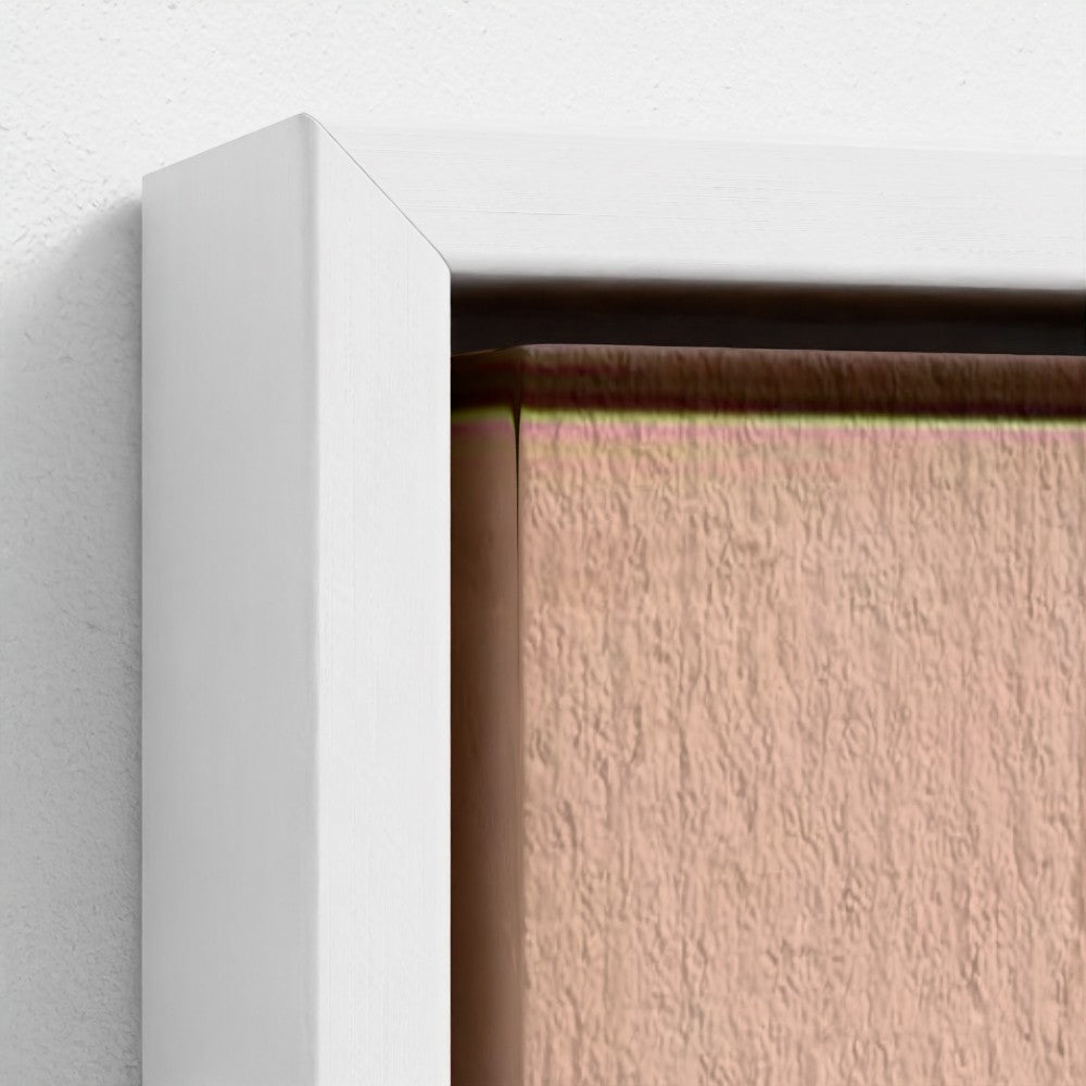 Close-up of a textured wall with a white frame corner.