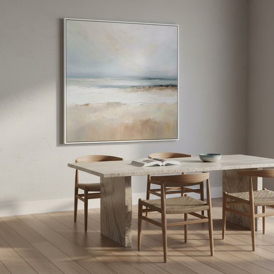 Dining room with a marble table and chairs, and a large abstract painting on the wall.
