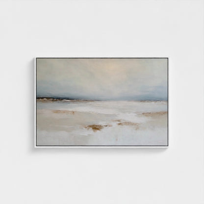 Framed abstract landscape painting on a white wall