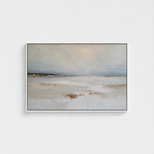 Framed abstract landscape painting on a white wall