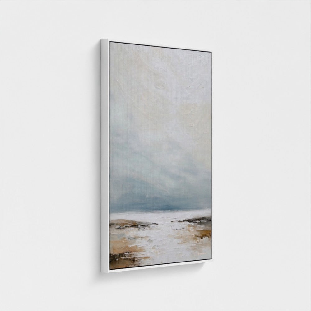 Framed artwork of a landscape with a body of water and sky.