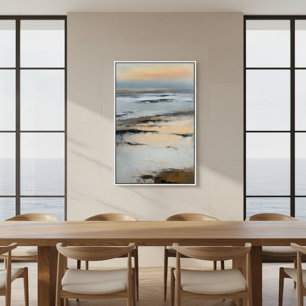 Abstract painting on a wall above a wooden dining table with chairs.