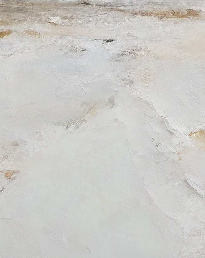 Close-up of a marble-like surface with beige and white patterns