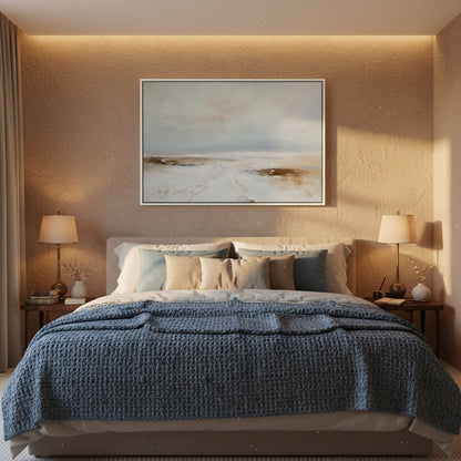 Cozy bedroom with a bed, lamps, and wall art