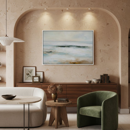 Modern living room with a green armchair, wooden table, and abstract painting on the wall.