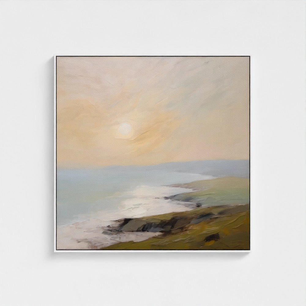 Framed artwork of a landscape with a sunset over a body of water.