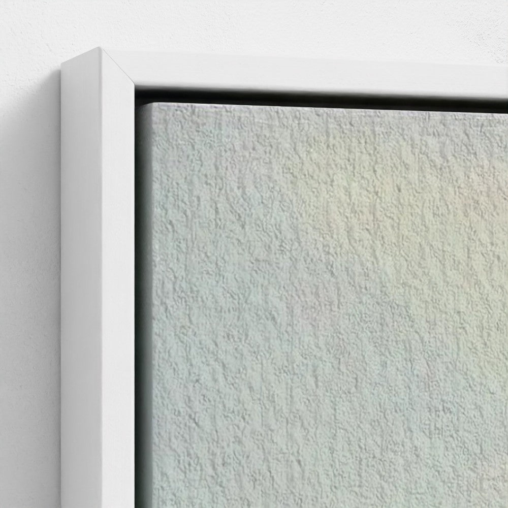 Close-up of a textured wall with a white frame.