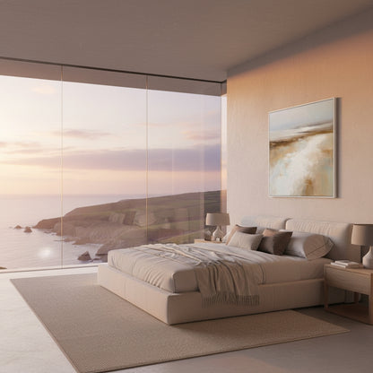 Modern bedroom with a large window view of a beach at sunset.