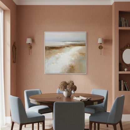 Dining room with a round wooden table and gray chairs, featuring a wall painting and bookshelf.