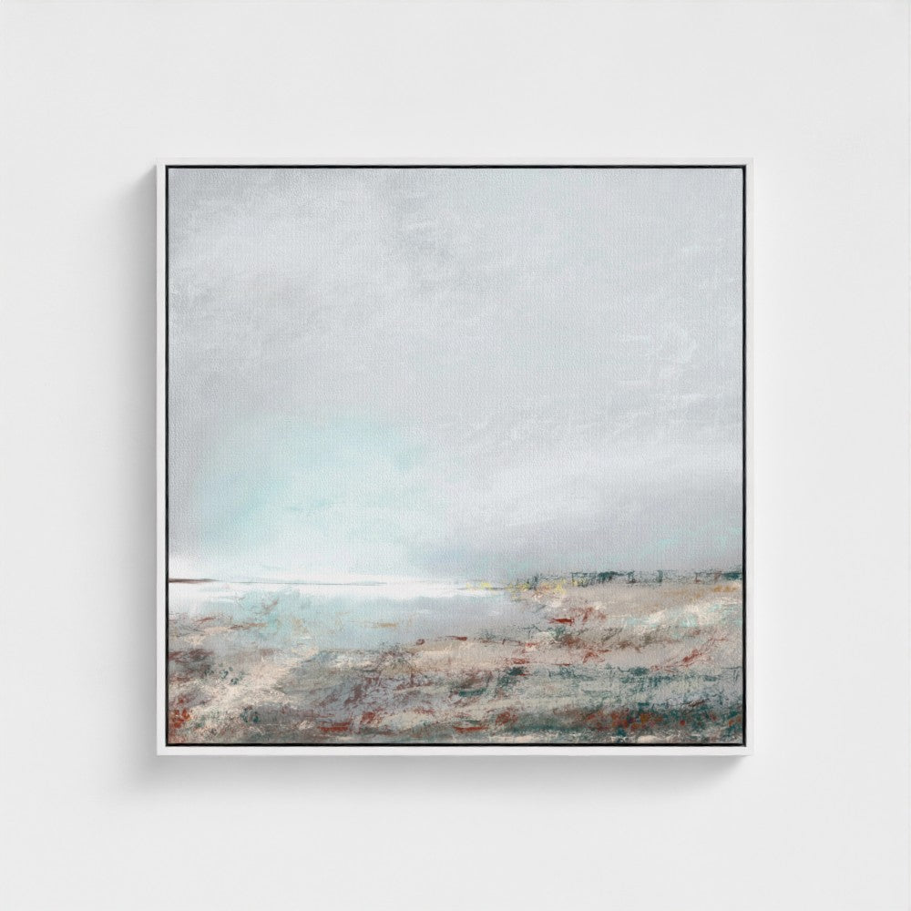 Framed artwork of a landscape with a body of water on a white background