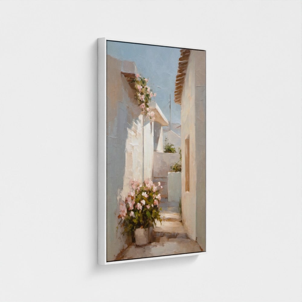 Framed artwork of a street scene with flowers and buildings on a white background