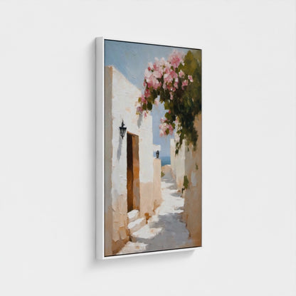 Framed artwork of a narrow street with a floral archway on a white background