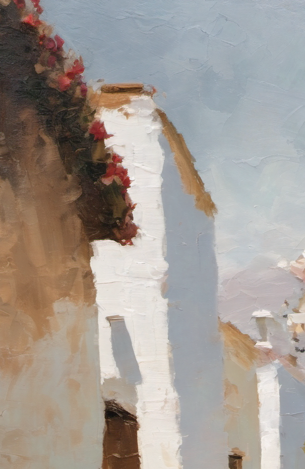 Close-up of a white wall with floral decorations against a light blue sky.