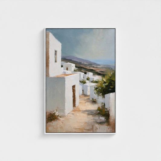 Framed artwork of a white building with a scenic background on a white wall