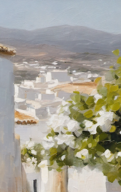 Village scene with white buildings and greenery in the foreground