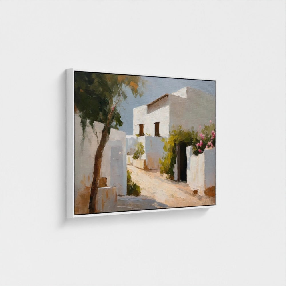 Framed artwork of a white building with trees and flowers on a white wall