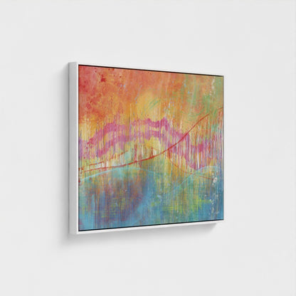 Abstract painting with vibrant colors on a white wall