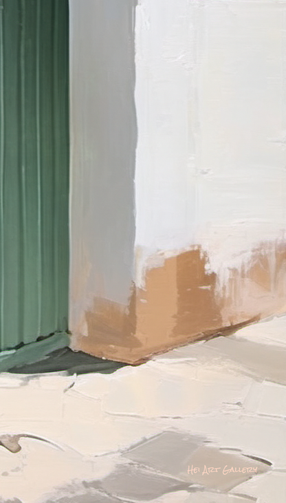Close-up of a corner with a green baseboard and white wall.