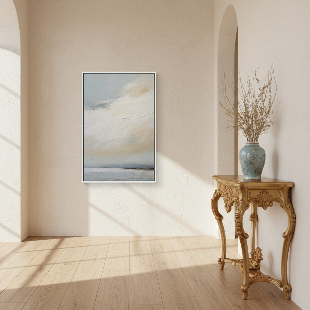 Framed abstract painting on a wall in a room with wooden floor and decorative table.