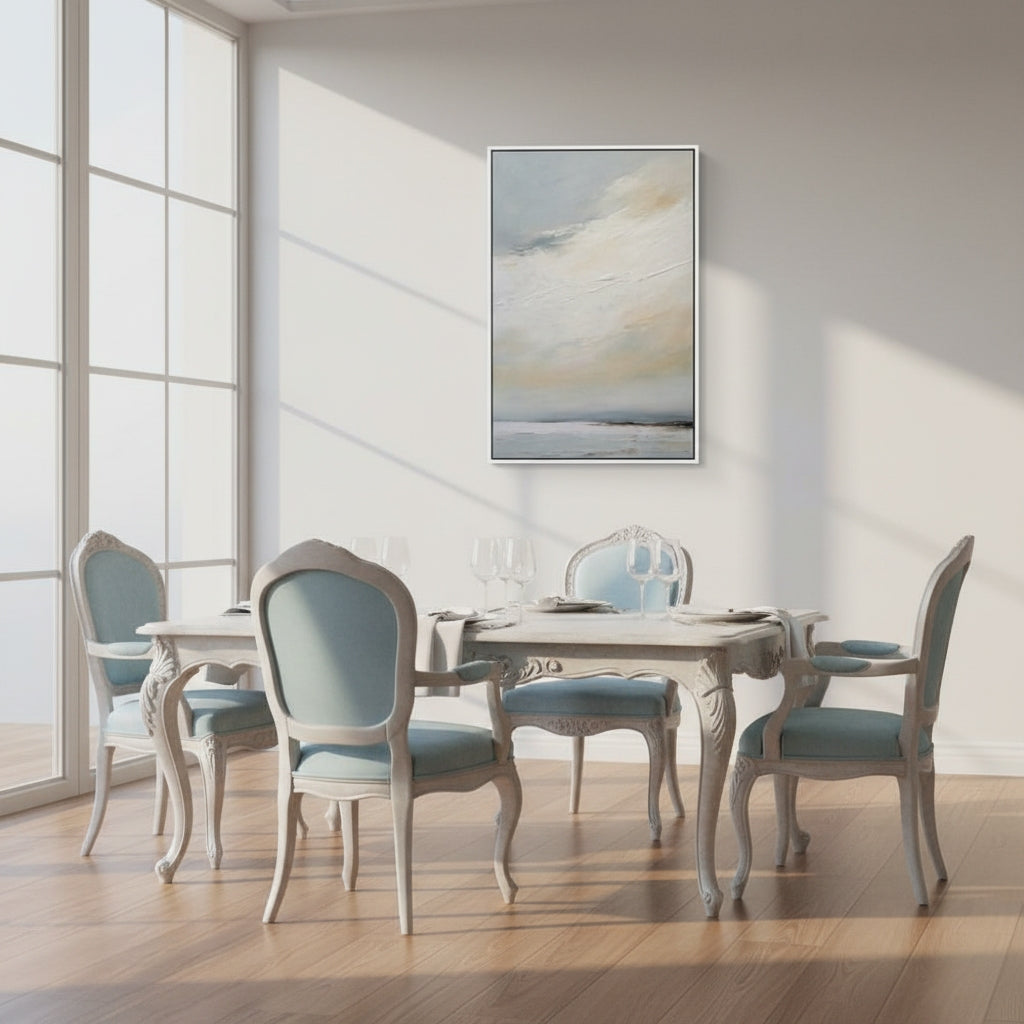 Dining room with a table and chairs, large window, and abstract painting on the wall.
