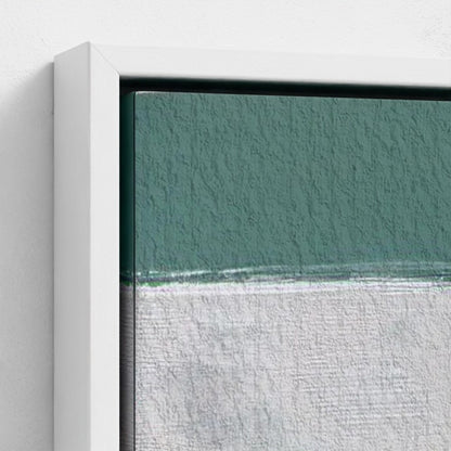 Close-up of a painting with a white frame, showing texture and color gradient.