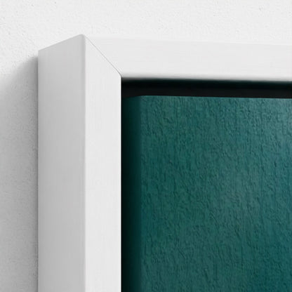 Close-up of a teal textured surface with a white frame.