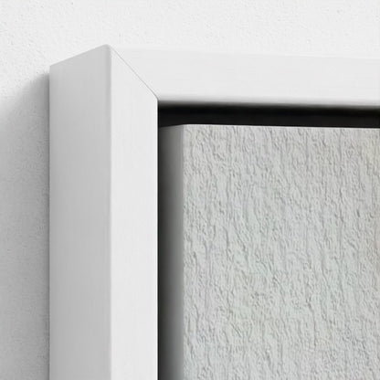 Close-up of a white frame corner on a textured white surface