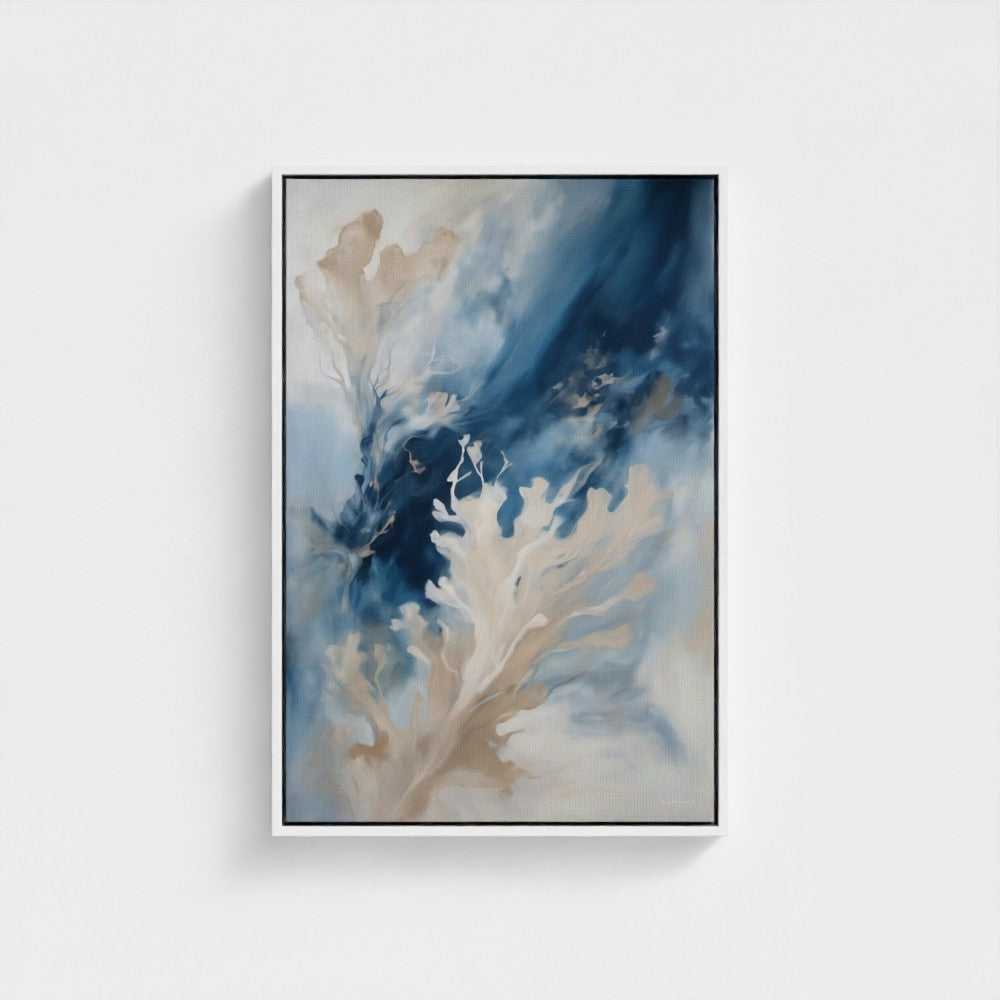 Framed artwork of abstract blue and beige design on a white wall