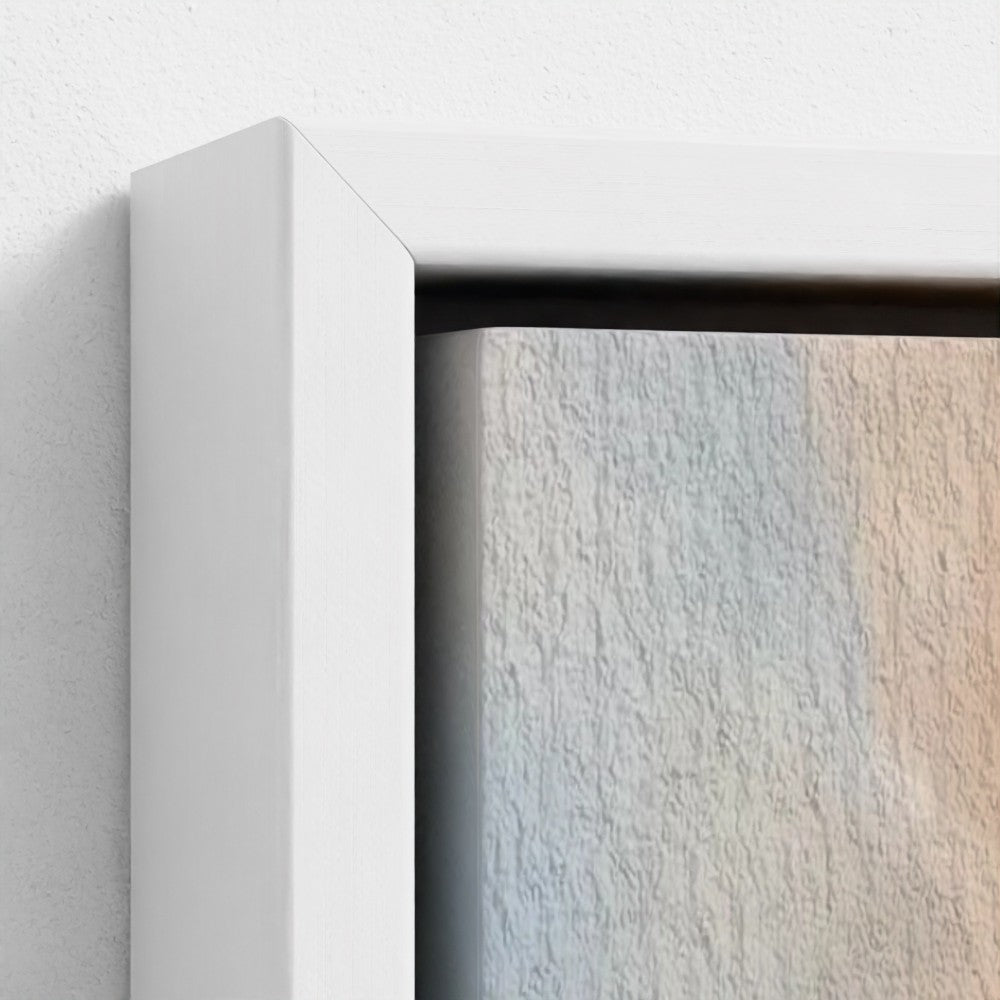 Close-up of a white frame corner with a textured wall background