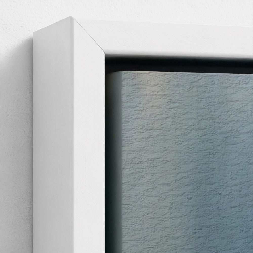 Close-up of a white frame corner with a textured blue background