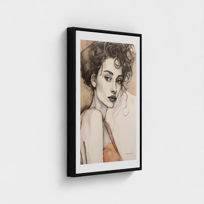 Framed artwork of a woman's portrait on a white wall