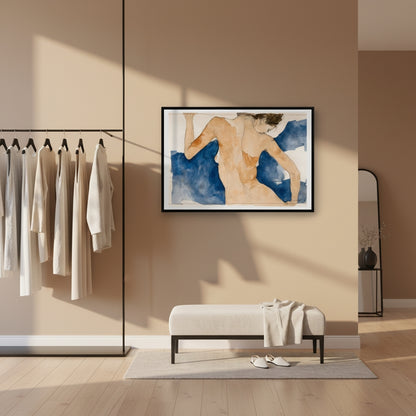 Modern interior with a framed abstract painting on a beige wall, a bench, and a rack of clothes.
