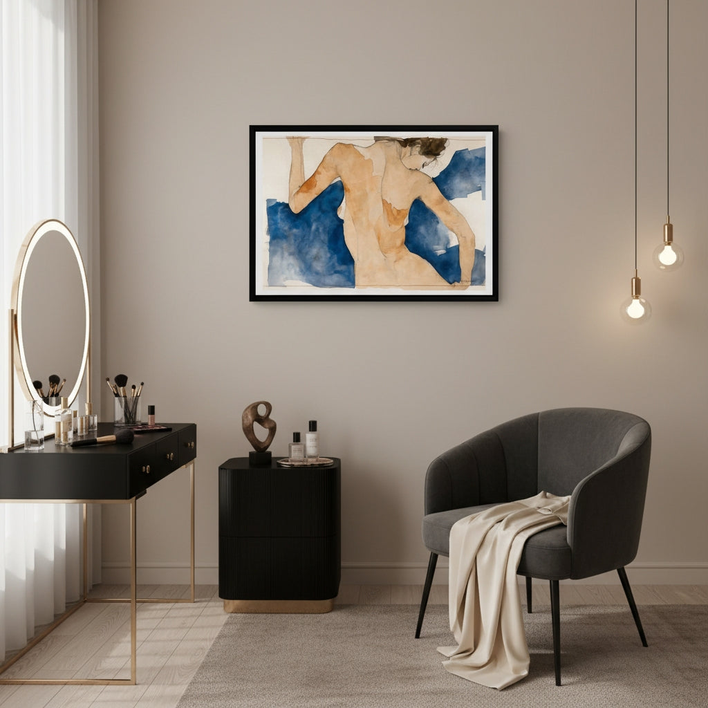 Modern interior with a black desk, gray chair, and framed artwork on a beige wall.