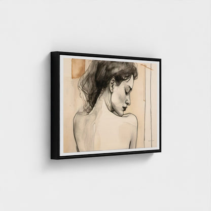 Framed artwork of a woman's profile on a white wall