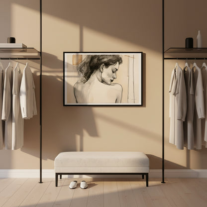 Modern interior with a framed artwork of a nude figure on a beige wall, flanked by clothing racks.