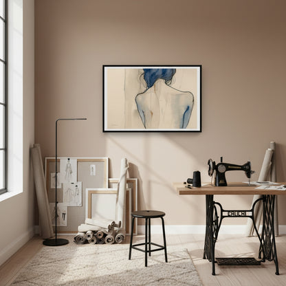 Home office with sewing machine, framed artwork, and wooden desk.