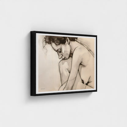 Framed artwork of a nude figure on a white wall