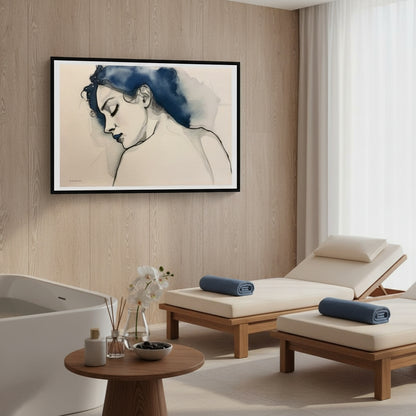 Modern interior with a bathtub, lounge chairs, and a framed artwork on the wall.