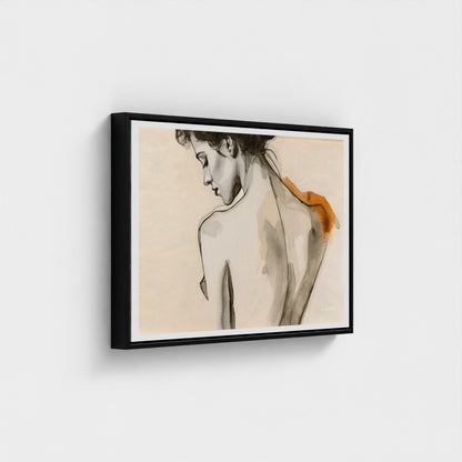 Framed artwork of a nude figure with a black frame on a white wall