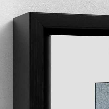 Close-up of a black picture frame on a white wall