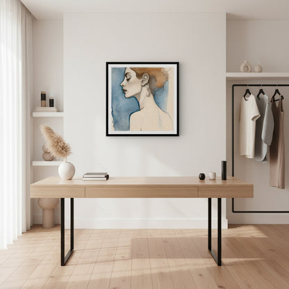 Modern interior with a wooden desk, framed artwork, and clothing rack.