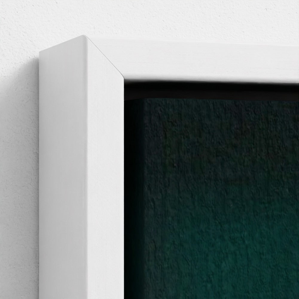 Close-up of a white frame corner with a dark green background