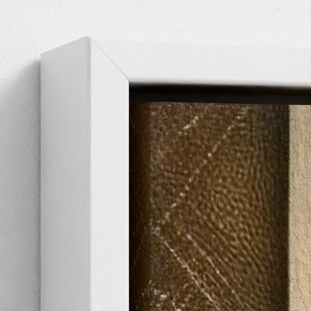 Close-up of a white frame corner with a textured brown surface inside