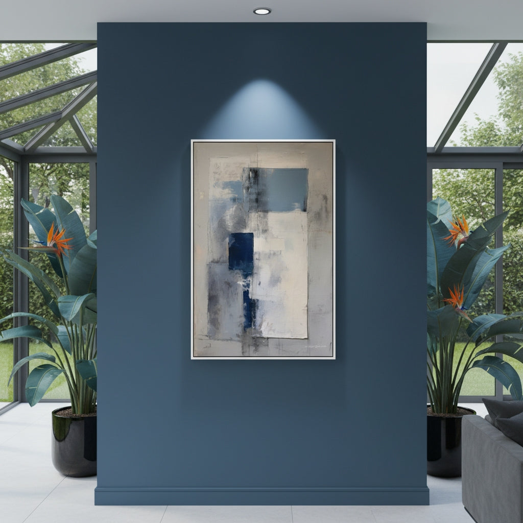 Abstract painting on a blue wall with plants and a sofa in the background