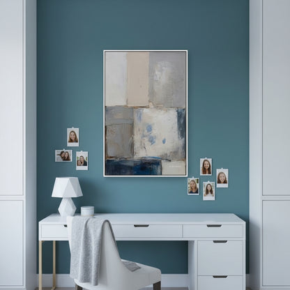 Modern office with a blue wall, white desk, and abstract art