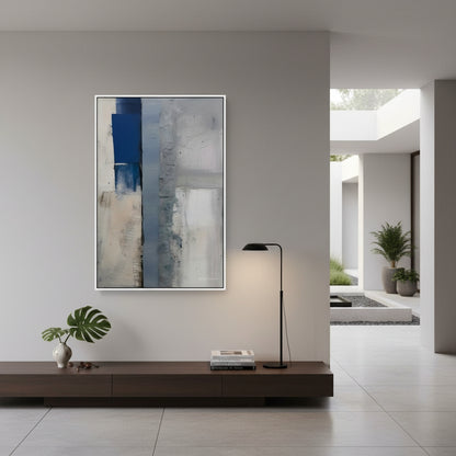 Modern interior with abstract art on the wall, floor lamp, and plant.