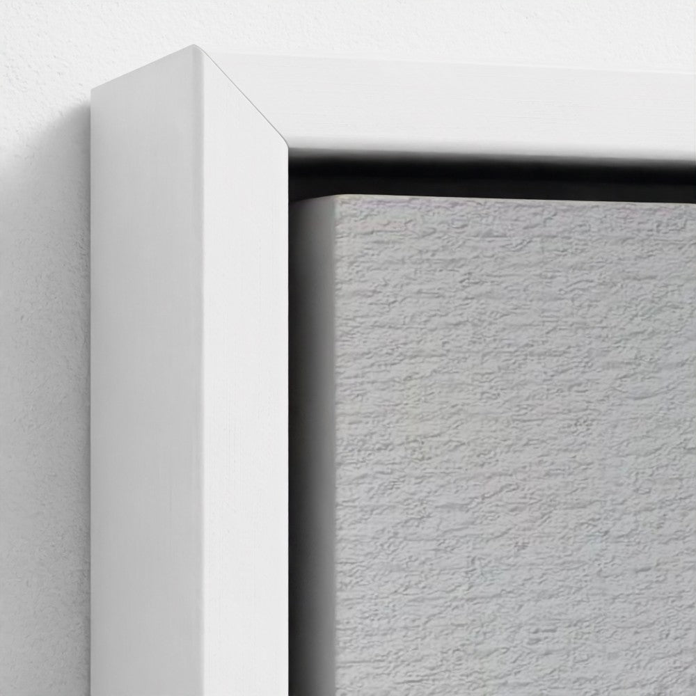 Close-up of a white frame corner on a textured white background